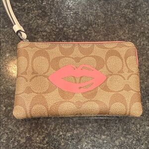 Coach Brown and Pink Lips Wristlet